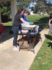 Angie Klosterman serving lunch at the Golden Triangle Golf Outing