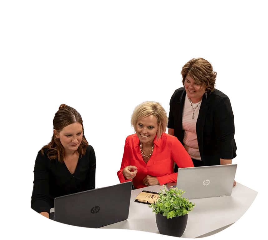 Kelly, mary and rachel looking at computers