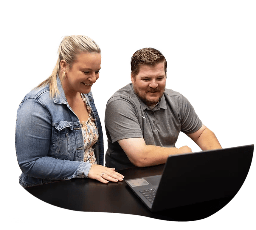 Two people working on a senior living marketing strategy