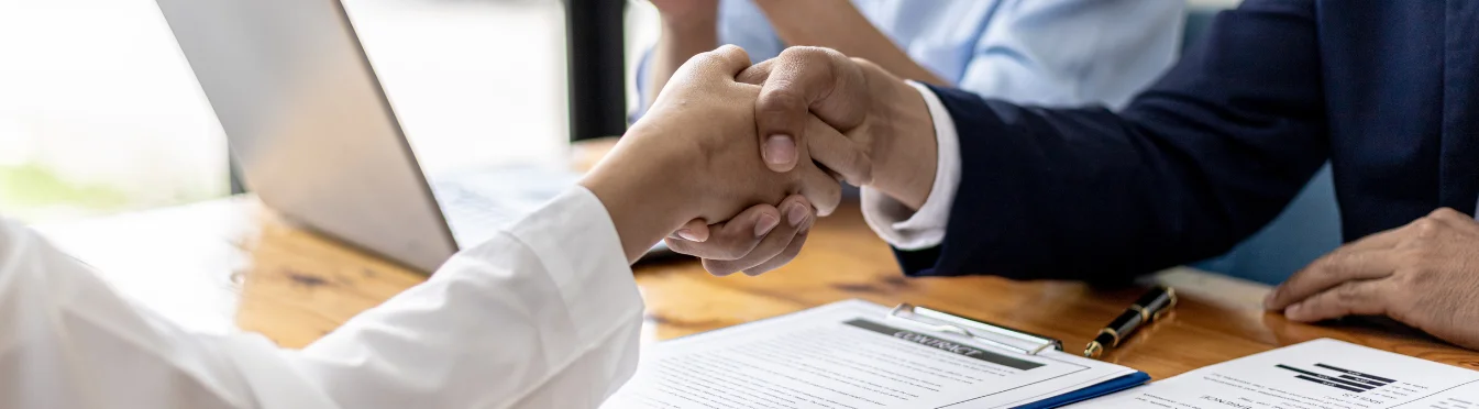 Recruiter Shaking New Employee’s Hand