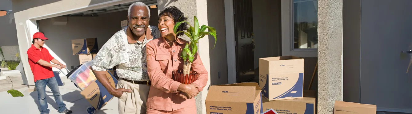 Senior couple moving out of their house